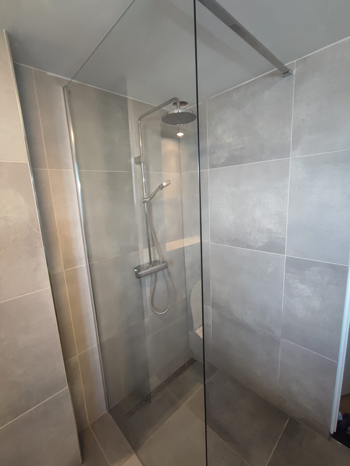 Mozaïek wandtegels vakkundig geplaatst door UNM Tegelzetbedrijf Deventer